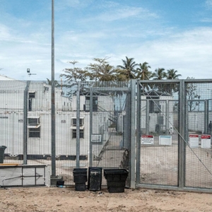 Refugee protests against companies providing services on Manus