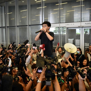 Prominent Hong Kong activists arrested after weeks of police violence at protests 