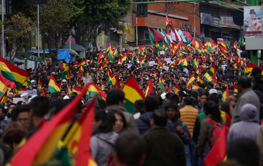 Contested elections in Bolivia stir mass protests with violent clashes